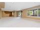 Spacious carpeted basement with neutral walls and natural light at 2043 Fendlebrush St, Highlands Ranch, CO 80129