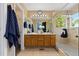 Double vanity bathroom leading to Primary bedroom with standalone glass shower, and towel racks at 2043 Fendlebrush St, Highlands Ranch, CO 80129