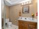 Bathroom featuring single sink vanity and toilet at 2043 Fendlebrush St, Highlands Ranch, CO 80129