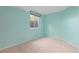Bedroom featuring blue walls and large window at 2043 Fendlebrush St, Highlands Ranch, CO 80129