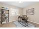 Bright home office featuring a desk, bookshelf, natural light, and a comfortable work space at 2043 Fendlebrush St, Highlands Ranch, CO 80129