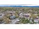 An aerial perspective highlights the property's placement in a bustling, tree-lined community at 675 Pierce St, Erie, CO 80516