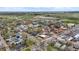 Aerial view displays the community and tree-lined street, highlighting the property's location within a desirable neighborhood at 675 Pierce St, Erie, CO 80516