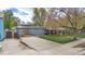 Inviting backyard with a covered patio, perfect for outdoor dining and relaxation, plus a shed for extra storage at 675 Pierce St, Erie, CO 80516