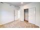 This bedroom features a sliding closet and attached bathroom at 23950 E 41St Ave, Aurora, CO 80019