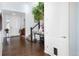 Elegant home foyer with hardwood floors, staircase, and a well-lit interior at 3385 Birch Rd, Longmont, CO 80504