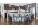 Modern kitchen with stainless steel appliances, granite countertops, and stylish island seating at 3385 Birch Rd, Longmont, CO 80504