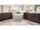 Bright main bathroom with a large bathtub and dual sink vanities at 3385 Birch Rd, Longmont, CO 80504