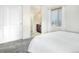 Serene main bedroom with ample natural light, neutral tones, and en-suite bathroom access at 3385 Birch Rd, Longmont, CO 80504