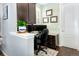 Functional home office space with a built-in desk, ample storage, and natural light at 3385 Birch Rd, Longmont, CO 80504