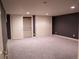 Finished basement with closet doors, carpeted flooring and recessed lighting at 8659 E Kenyon Ave, Denver, CO 80237