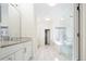 Bathroom with double vanity and a walk-in shower at 335 Josephine St # A, Denver, CO 80206