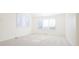 Spacious bedroom with large windows and window shutters at 335 Josephine St # A, Denver, CO 80206