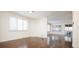 Bright dining room with hardwood floors and access to other rooms at 335 Josephine St # A, Denver, CO 80206