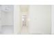 Long hallway with carpeted floors and access to bedrooms at 335 Josephine St # A, Denver, CO 80206