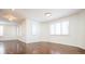 Spacious living room with hardwood floors and large windows at 335 Josephine St # A, Denver, CO 80206