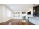 Living room with hardwood floors and sliding door to patio at 335 Josephine St # A, Denver, CO 80206