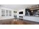 Living room with hardwood floors, fireplace, and sliding door to patio at 335 Josephine St # A, Denver, CO 80206