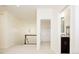 Upstairs hallway with light carpeting, and access to bedrooms and bathroom at 335 Josephine St # A, Denver, CO 80206