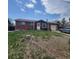 Charming home with a well-maintained lawn, and a convenient attached garage at 9008 Dover St, Broomfield, CO 80021