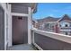 A private balcony with exterior storage, privacy features, and views of the community at 14251 E 1St Dr # 308, Aurora, CO 80011