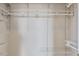 This is a walk-in closet featuring multiple shelves, racks and a hanger rod at 14251 E 1St Dr # 308, Aurora, CO 80011