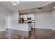 Open kitchen with white cabinets and granite countertops, great for entertaining guests at 14251 E 1St Dr # 308, Aurora, CO 80011