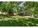 Spacious backyard with a lush lawn, covered patio and wood fence at 5625 W 109Th Cir, Westminster, CO 80020