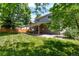 Spacious backyard with a lush lawn, covered patio and wood fence at 5625 W 109Th Cir, Westminster, CO 80020