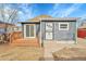 Backyard features a wood deck, siding and yard at 3368 W Gill Pl, Denver, CO 80219