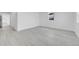 Bright and airy living room featuring pristine white walls, modern floors, and ample natural light at 3368 W Gill Pl, Denver, CO 80219
