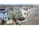 Aerial view of the home featuring a backyard with a deck, patio, and mature trees at 11836 Columbine St, Thornton, CO 80233