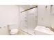 Modern bathroom with a glass enclosed shower, stylish vanity, and updated fixtures at 11836 Columbine St, Thornton, CO 80233
