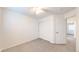 Serene bedroom with soft carpet, a ceiling fan, a double-door closet, and fresh white paint at 11836 Columbine St, Thornton, CO 80233