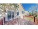 Back deck with a sliding glass door entry to the home and wood plank flooring at 11836 Columbine St, Thornton, CO 80233
