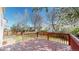 Beautiful wooden deck with a view of the backyard, perfect for enjoying the outdoors at 11836 Columbine St, Thornton, CO 80233