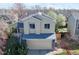 Charming two-story home featuring a two-car garage and a well-maintained front yard at 11836 Columbine St, Thornton, CO 80233