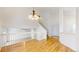 Bright living room boasting hardwood floors, high ceilings and elegant chandelier at 11836 Columbine St, Thornton, CO 80233