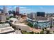 Expansive aerial view captures the city's diverse architecture with a mix of modern and historic buildings at 55 W 12Th Ave # 211, Denver, CO 80204