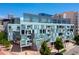 Contemporary building featuring large windows and geometric designs, blending urban aesthetics with architectural innovation at 55 W 12Th Ave # 211, Denver, CO 80204