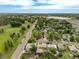 Beautiful property boasts mature trees, manicured lawn, and convenient access to nearby golf course, lake, and highway at 4891 Depew St, Denver, CO 80212