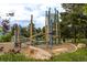 Community playground featuring unique climbing structures and recreational equipment for children at 4891 Depew St, Denver, CO 80212