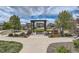 Picturesque community park featuring a picnic table and wooden trellis, providing a serene spot for neighborhood gatherings at 8133 Arapahoe Peak St, Littleton, CO 80125