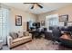 Functional home office with two workstations and comfortable seating area at 8133 Arapahoe Peak St, Littleton, CO 80125