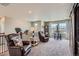 Spacious loft featuring comfortable seating, scenic views, and stylish decor at 8133 Arapahoe Peak St, Littleton, CO 80125