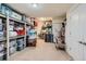 Well-organized storage room with ample shelving, providing efficient space for all storage needs in a clean environment at 8133 Arapahoe Peak St, Littleton, CO 80125