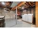 Basement with exposed ductwork and a washer and dryer set at 1876 S Adams St, Denver, CO 80210