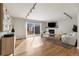 Living room featuring a fireplace and sliding doors to backyard at 1876 S Adams St, Denver, CO 80210