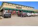 Bruegger's Bagels and Starbucks Coffee shops offer baked fresh bagels and coffee on a sunny day for local residents at 1876 S Adams St, Denver, CO 80210