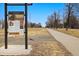 Scenic view of Historic Buchetei Boulevard Trail and Prariui-Park information in a quiet neighborhood on a beautiful blue sky day at 1876 S Adams St, Denver, CO 80210